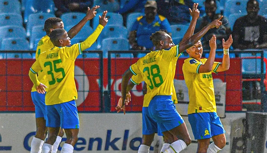 Mamelodi Sundowns players celebrating a goal against Royal AM