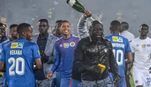 Kaitano Tembo celebrating MTN 8 victory with SuperSport United players