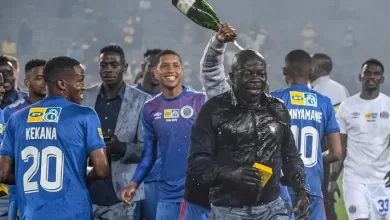 Kaitano Tembo celebrating MTN 8 victory with SuperSport United players