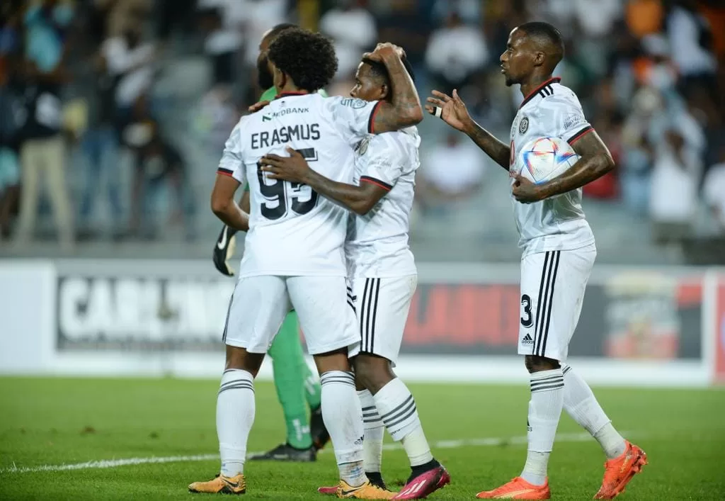 Kermit Erasmus celebrates with teammates