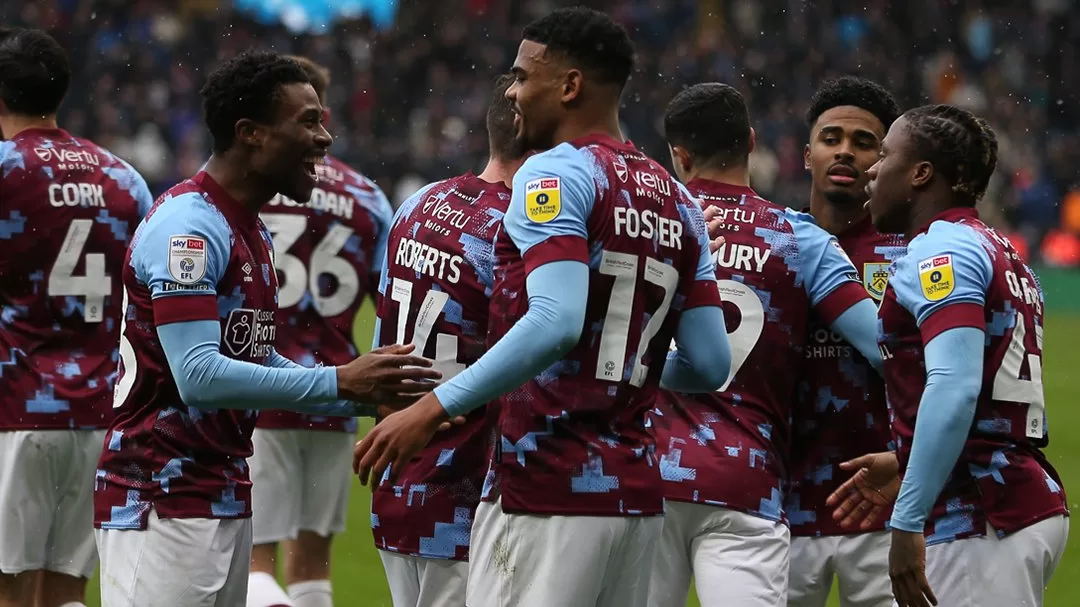 Lyle Foster celebrating a goal with teammates