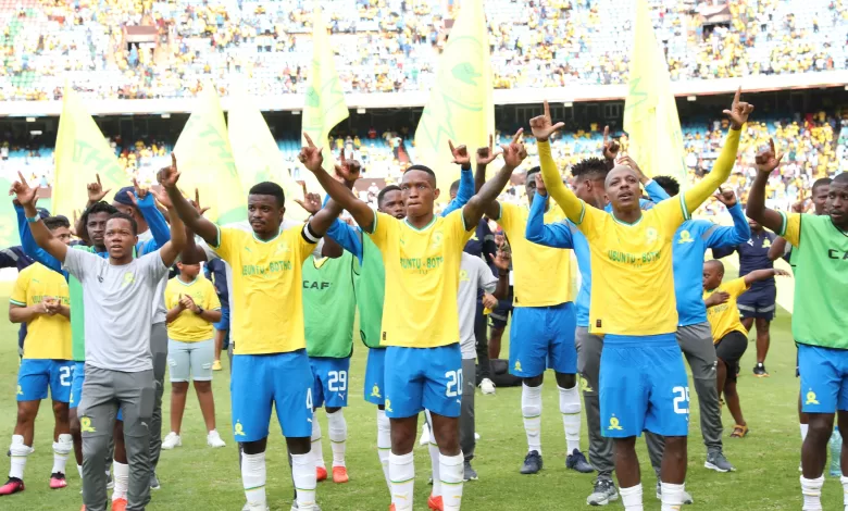 Mamelodi Sundowns players greeting their fans.