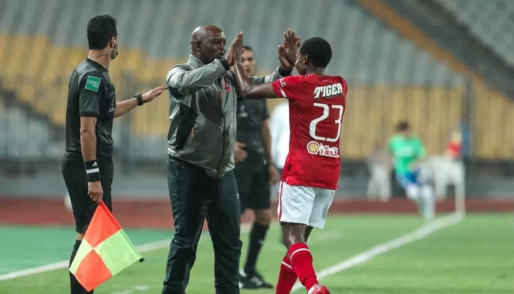 Pitso Mosimane and Percy Tau during their Al Ahly days