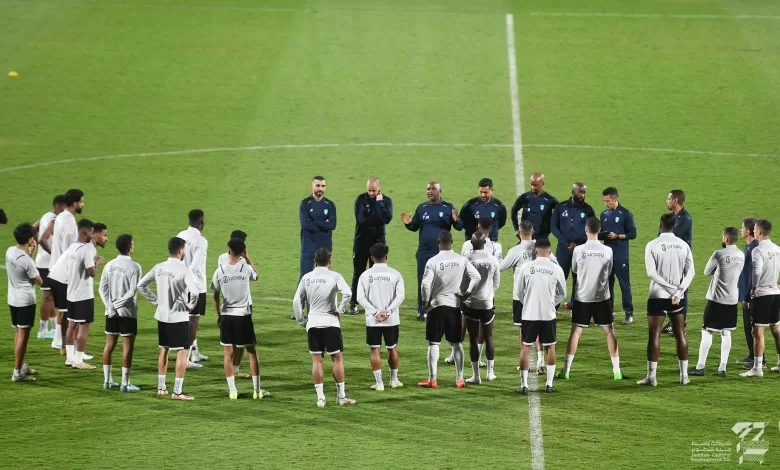 Pitso Mosimane with his Al Ahli players