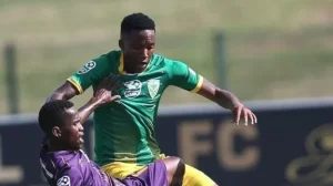 Pule Mmodi and Kabelo Mahlasela fighting over the ball