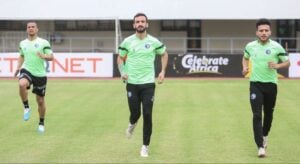 Fagrie Lakay warming up with his Pyramids teammates