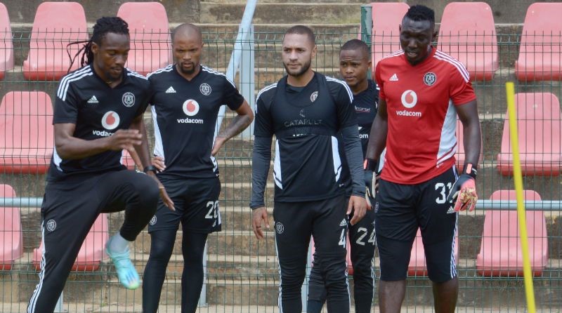 Richard Ofori alongside his Orlando Pirates teammate