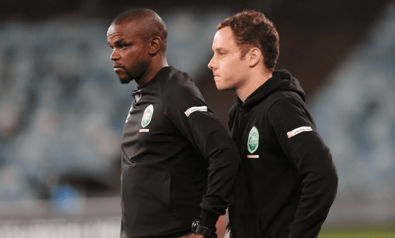 Romain Folz and Ayanda Dlamini on the touchline