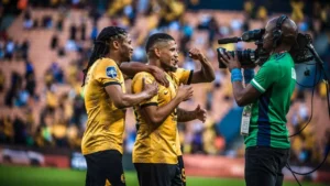 Kaizer Chiefs players celebrating after scoring.