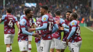 Soon to be Premier League player, Lyle Foster and his teammates celebrating a goal