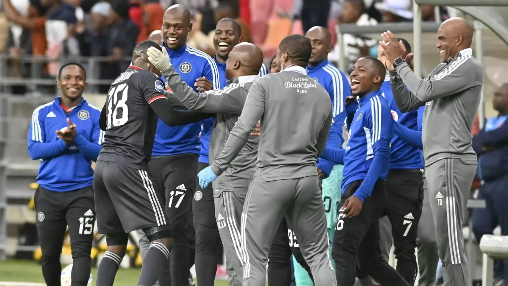 Orlando Pirates technical team and players in celebratory mood. 