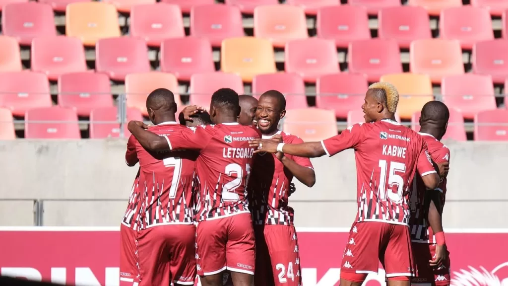 Sekhukhune United troops celebrating after scoring. 