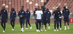 Sekhukhune United players doing pitch inspection