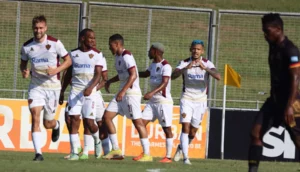 Stellenbosch players celebrating a goal against Royal AM