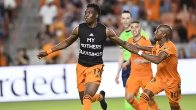 Teenage Hadebe celebrates a goal for Houston Dynamo.