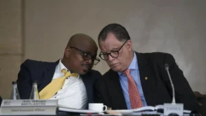 Advocate Tebogo Motlanthe and Danny Jordaan addressing the media.