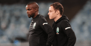 Ayanda Dlamini and Romain Folz on the touchline