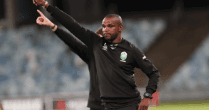 Ayanda Dlamini and Romain Folz on the touchline