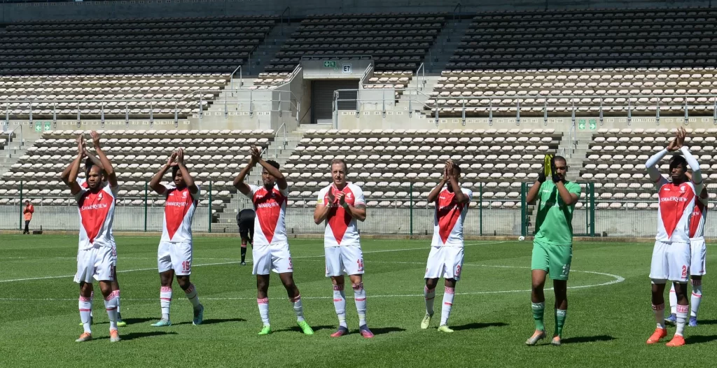 Cape Town Spurs players applaud their fans before a game 