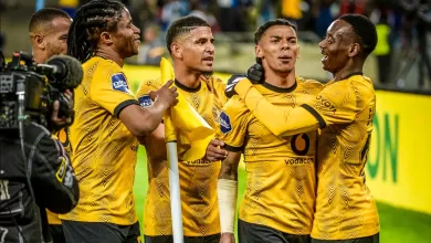 Dillan Solomons celebrating a goal with his Kaizer Chiefs teammates.