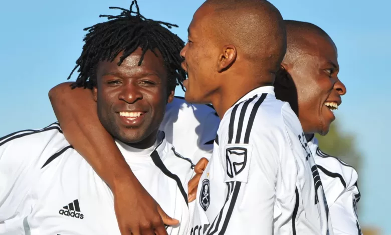 Former Orlando Pirates players celebrating a goal with Gilbert Mushangazhike among them.