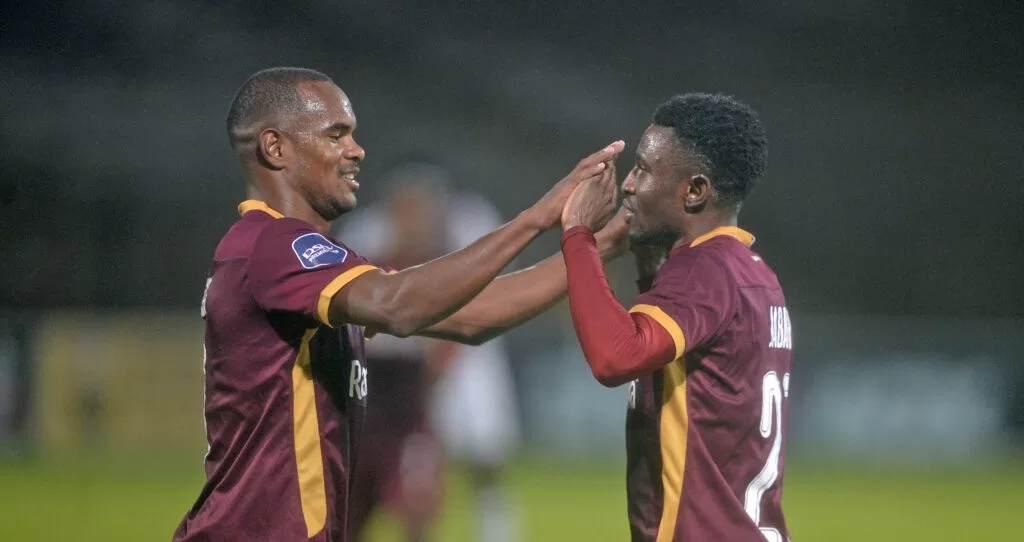 Iqraam Rayner celebrates with Qobolwakhe Sibande