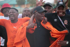 Polokwane City Chairman Johnny Mogaladi reacts to the club's promotion