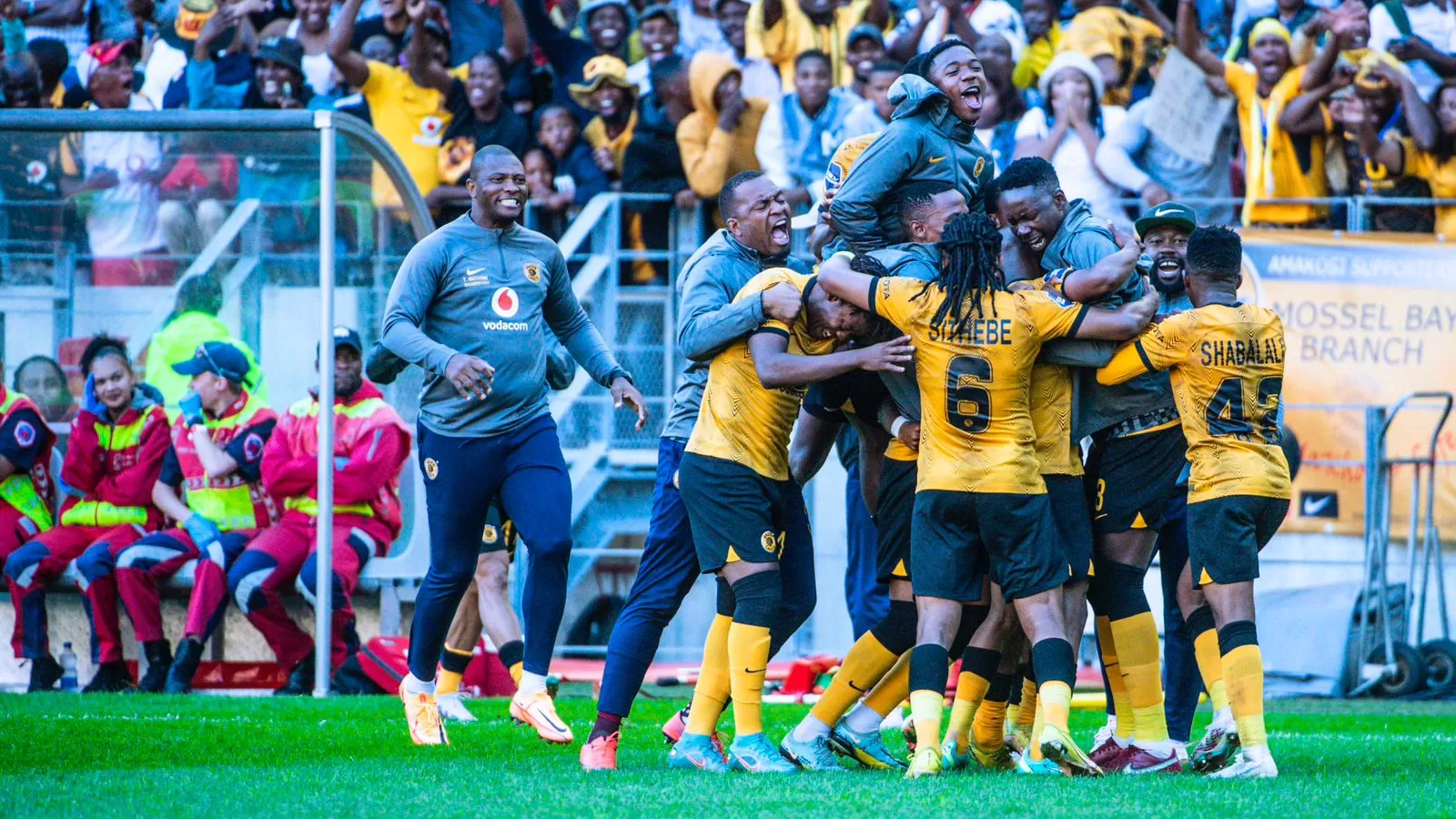 Itumeleng Khune celebrating a goal with his teammates recently
