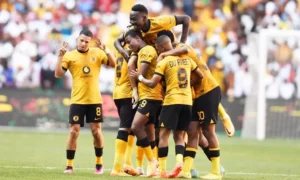 Former David Kannemeyer's club Kaizer Chiefs players celebrate a goal