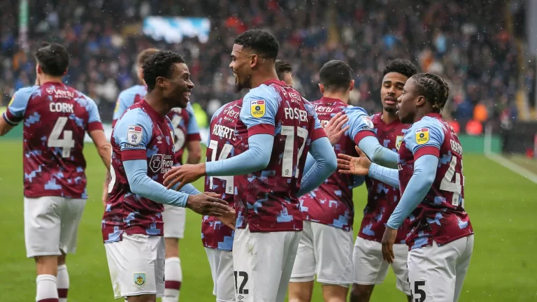Lyle Foster [number 12], celebrating with his teammates. Photo courtesy of Burnley.