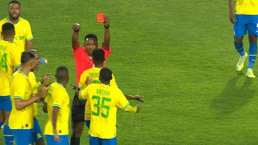 Neo Maema receives red card after a VAR review.