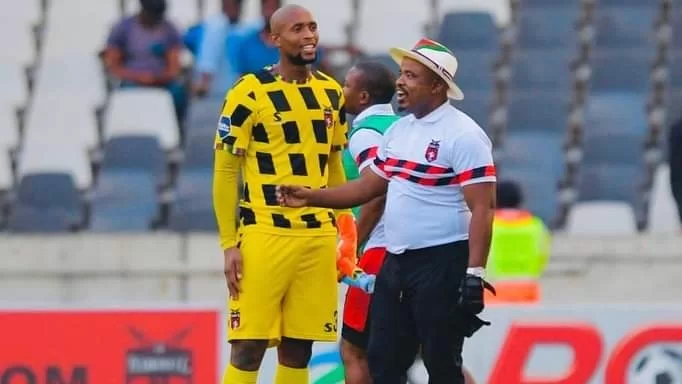 Goalkeeper Melusi Buthelezi and TS Galaxy president Tim Sukazi.