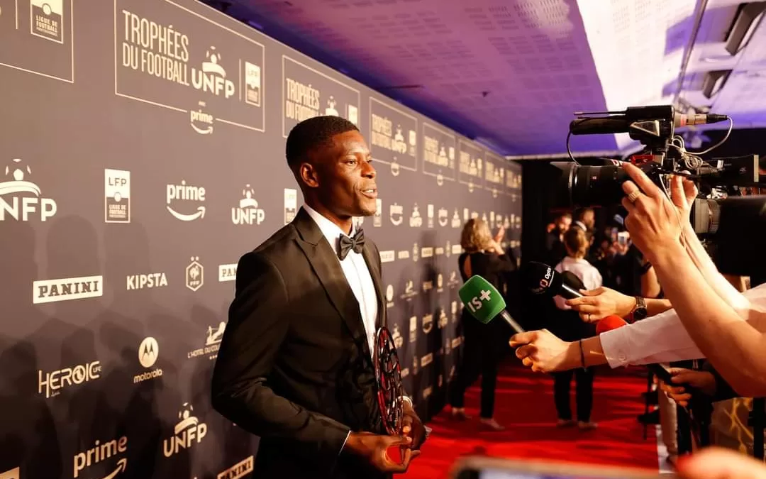 Marshal Munetsi after receiving the French Ligue 1 award. Photo by Stade de Reims