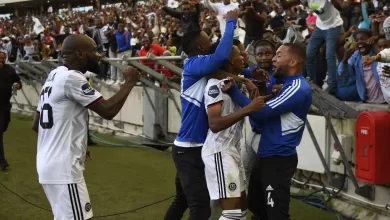 Orlando Pirates players celebrating a goal against AmaZulu FC. One of their players will miss the Nedbank Cup game