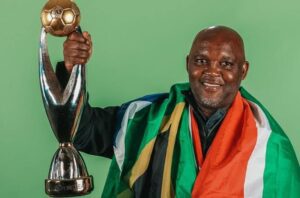 South African coach Pitso Mosimane with the CAF Champions League trophy