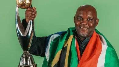 South African coach Pitso Mosimane with the CAF Champions League trophy