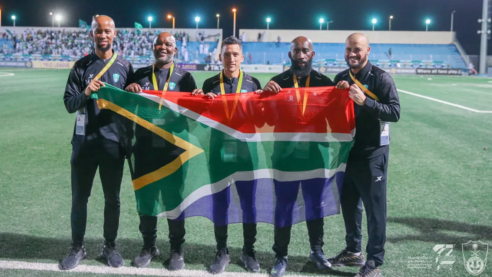 Pitso Mosimane and members of his backroom staff after awakening the sleeping giant that is Al Ahli