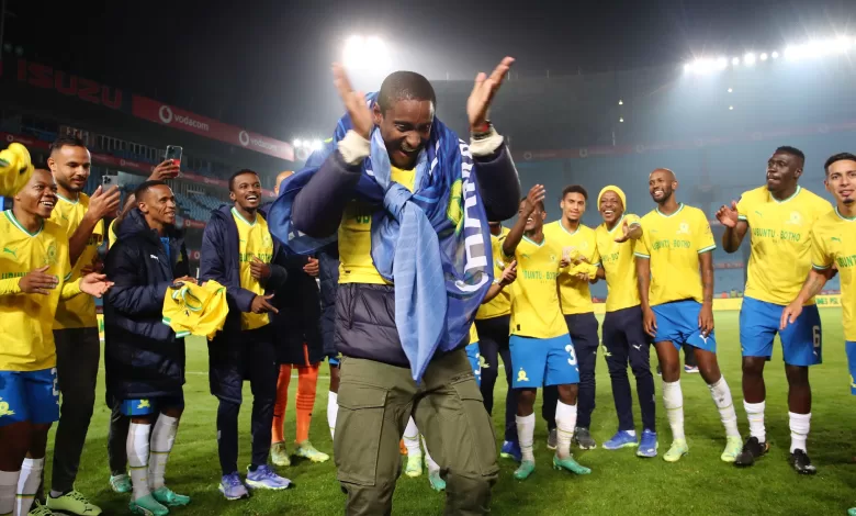 Rulani Mokwena celebrating DStv Premiership championship with Mamelodi Sundowns