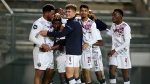 Swallows FC players celebrating a goal