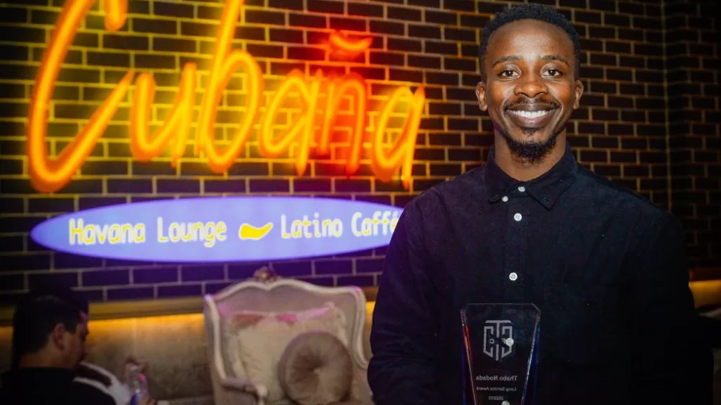 Thabo Nodada showing off his Long Service Award at Cape Town City.