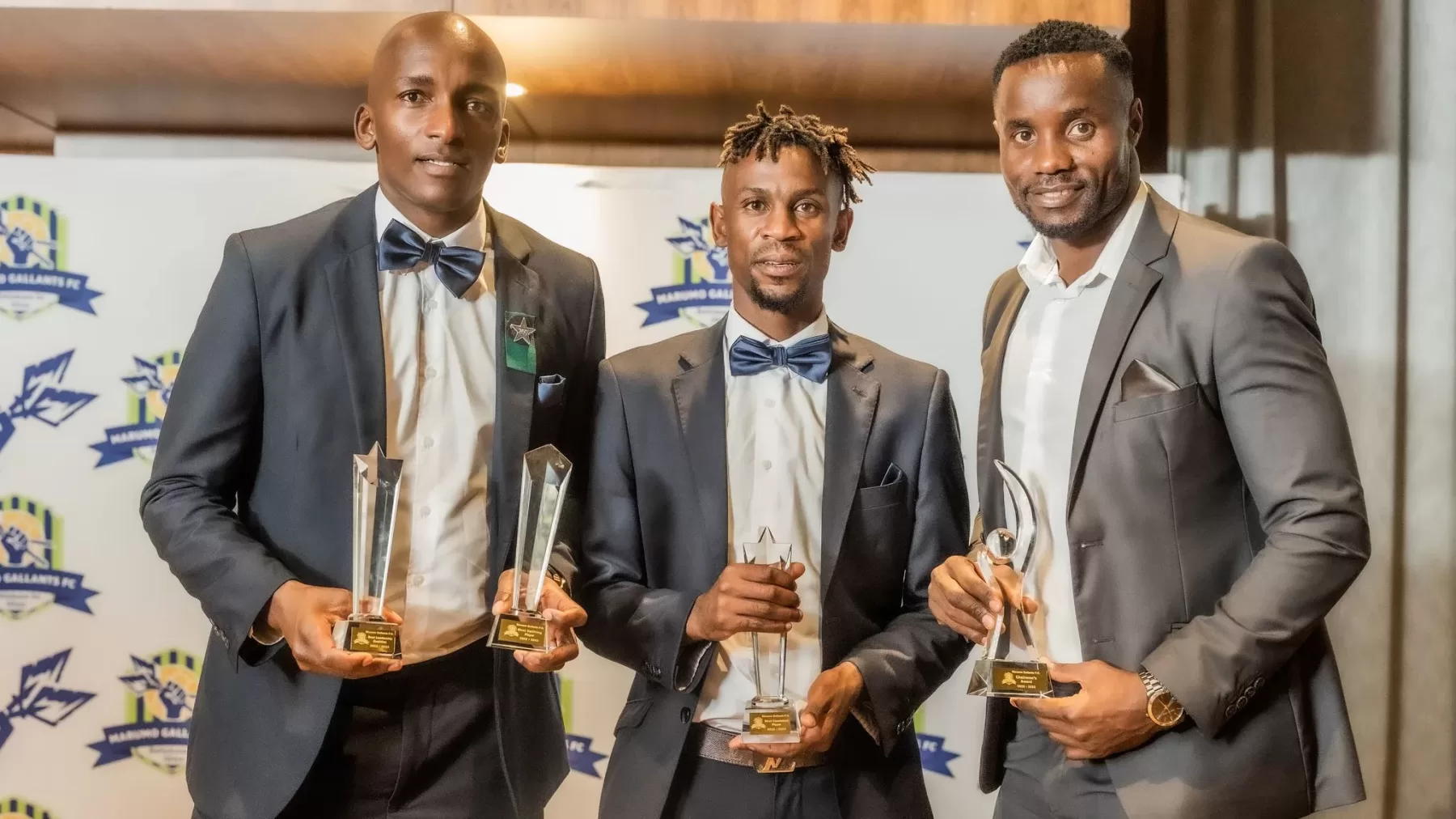 Washington Arubi [right] was among the award winners at Marumo's end-of-season awards