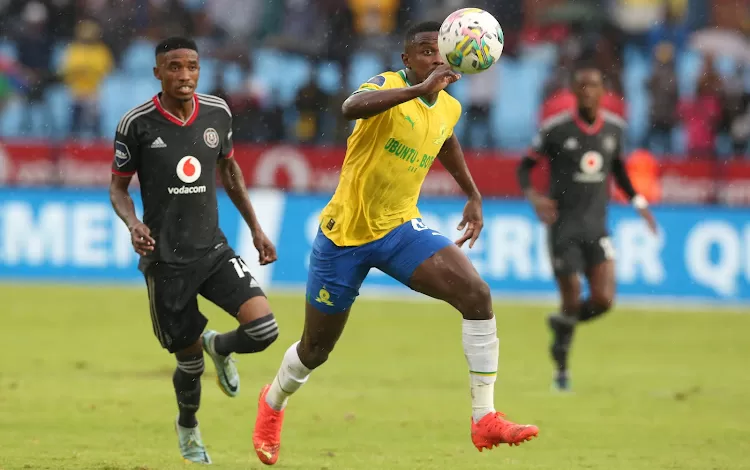 Orlando Pirates winger Monnapule Saleng and Mamelodi Sundowns' Teboho Mokoena during a PSL game