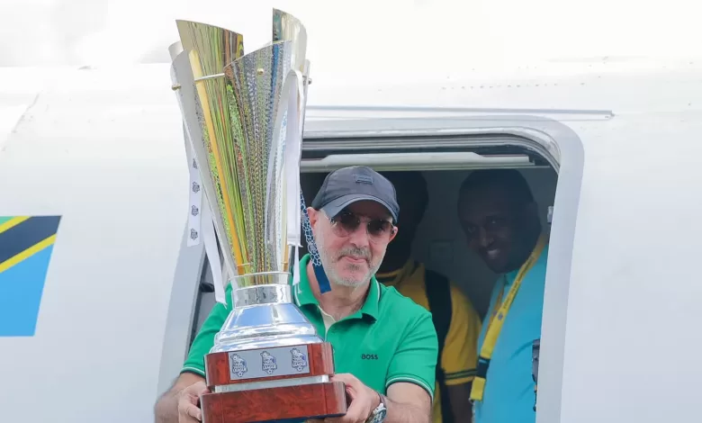 Nasreddine Nabi holding one of the three trophies he won at Yanga. He is linked with Kaizer Chiefs