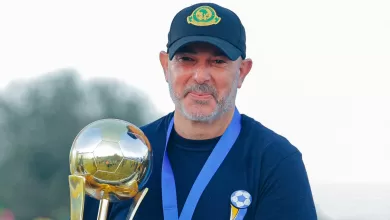 Nasreddine Nabi with a trophy he won with Yanga