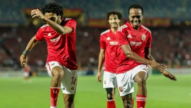 Percy Tau celebrating a goal with his Al Ahly teammate