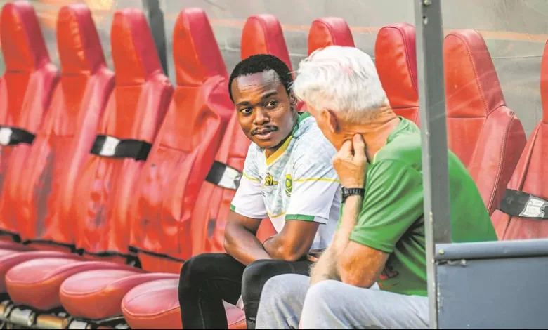 Percy Tau with Bafana Bafana coach Hugo Broos at FNB Stadium