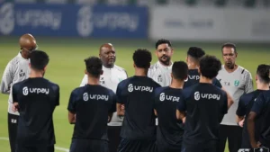 Pitso Mosimane with Al Ahli Saudi players.