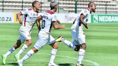 Stellenbosch FC players celebrating a goal.