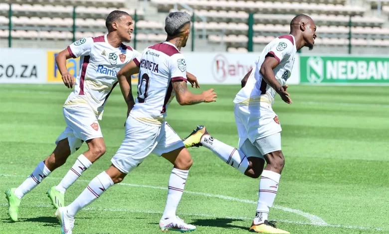 Stellenbosch FC players celebrating a goal.