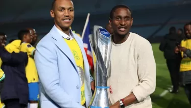 Tlhopie Motsepe and Rulani Mokwena of Mamelodi Sundowns holding the league trophuy